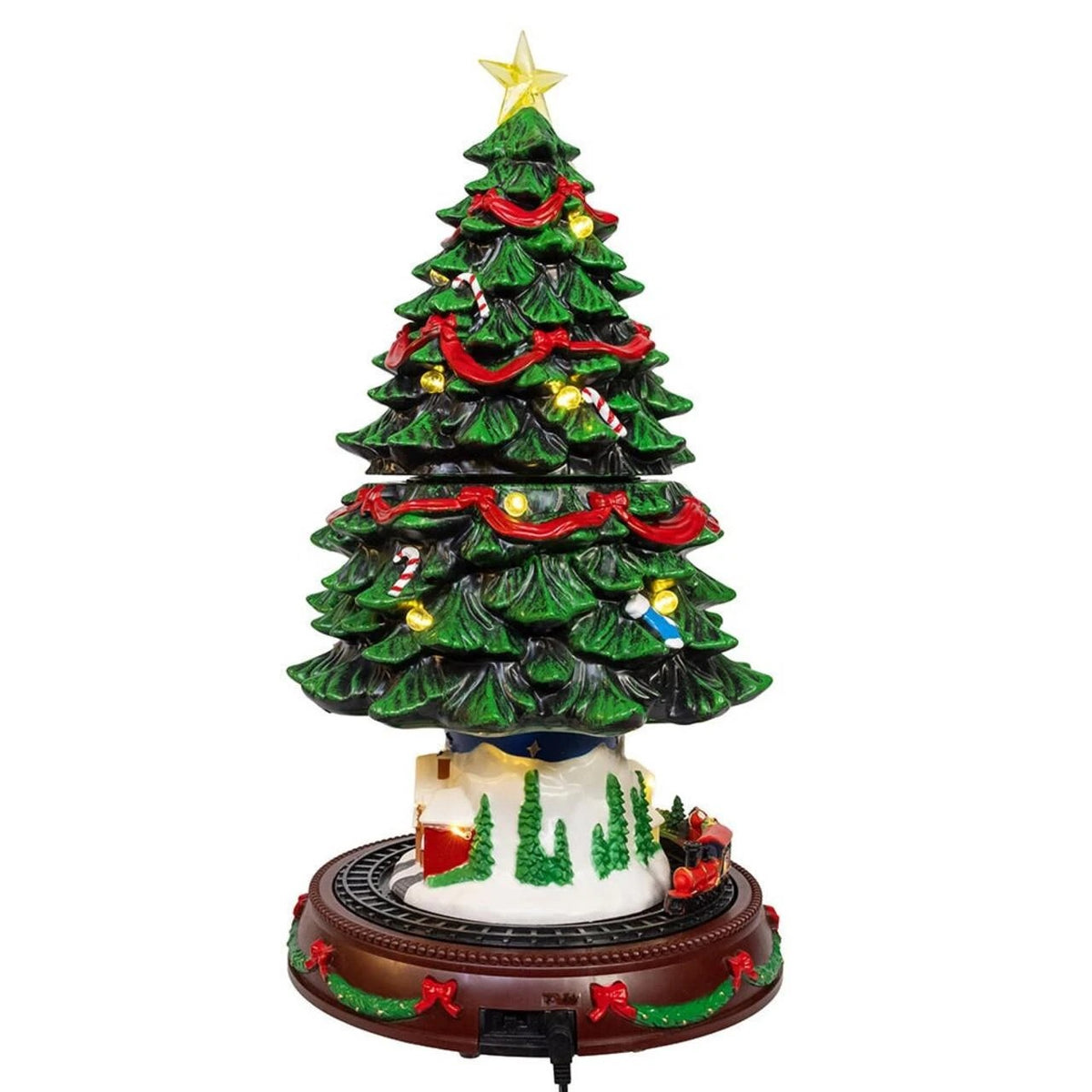 Musical animated Christmas tree with a star topper, red garland, and a train on a rotating base.
