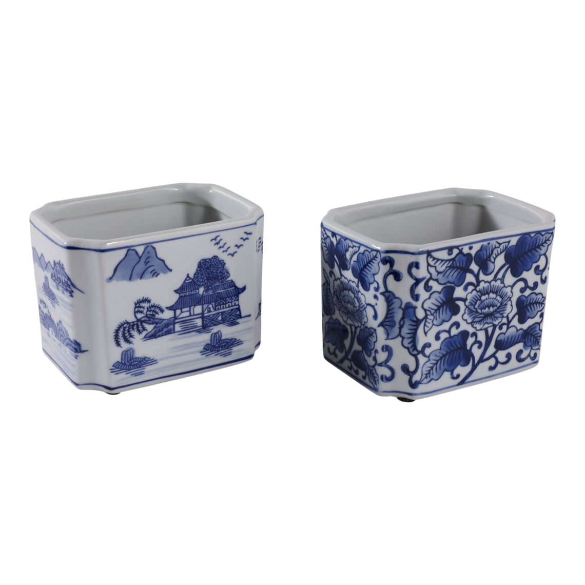 Two rectangular blue and white ceramic pencil cups with floral and landscape patterns.