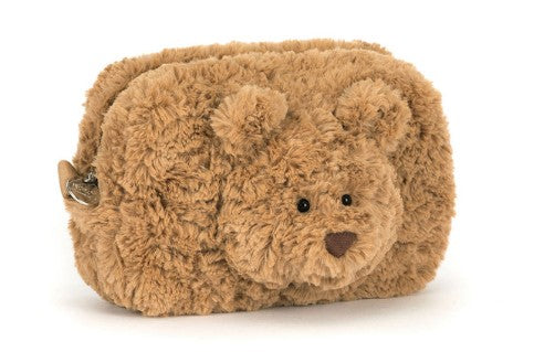 Bartholomew Bear Pouch made of fuzzy brown plush with a teddy bear face and small ears.