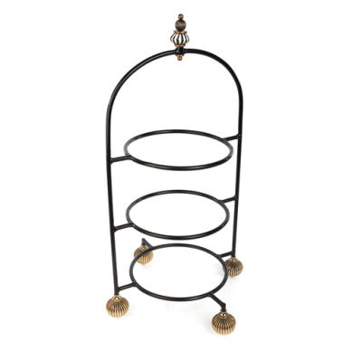 Large black iron three-tier plate stand with brass bun feet and a decorative top finial.