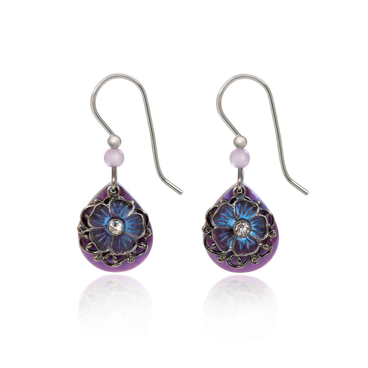 Silver tear earrings with purple teardrops, blue flower accents, and surgical steel French hooks.