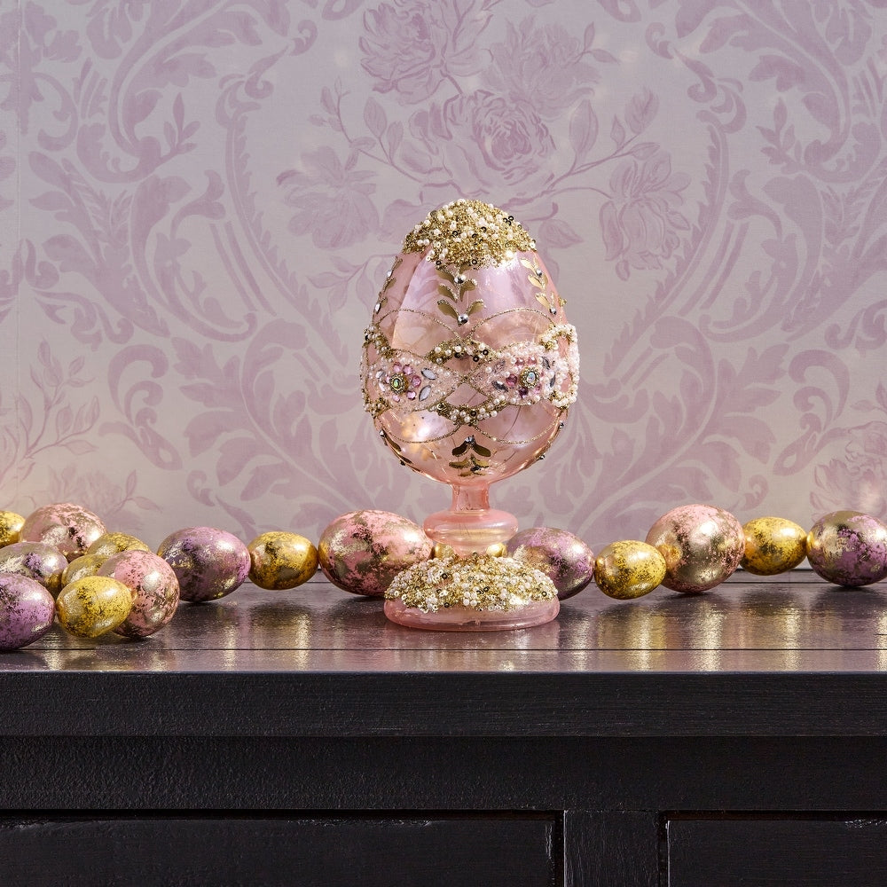 8-inch glass egg pedestal with warm white LED lights and sparkling jewel accents on a faceted surface.