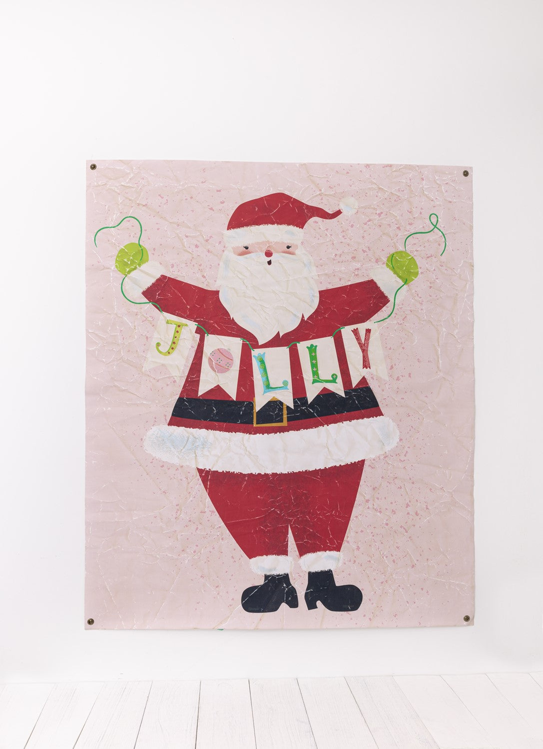 A 38x46 inch paper art poster of a whimsical Santa Claus holding a banner that spells JOLLY.