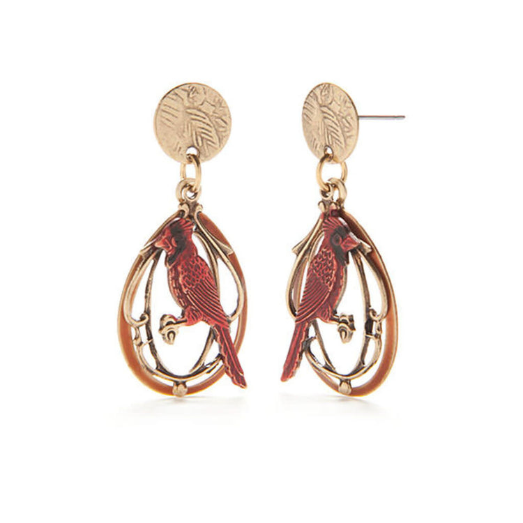 Gold-tone drop earrings featuring a red cardinal perched on a filigree tree branch design.