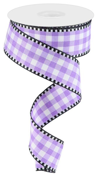 A roll of white fabric with a blue gingham check pattern.