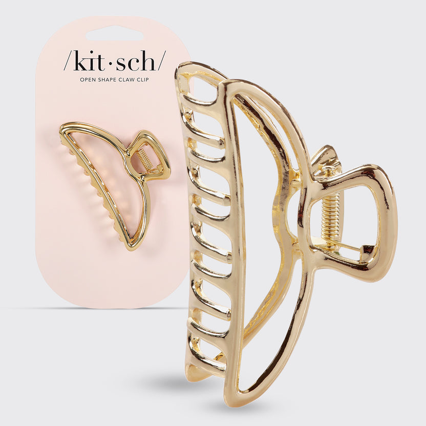 Open shape metal claw clip with rounded teeth in a simple elegant design.
