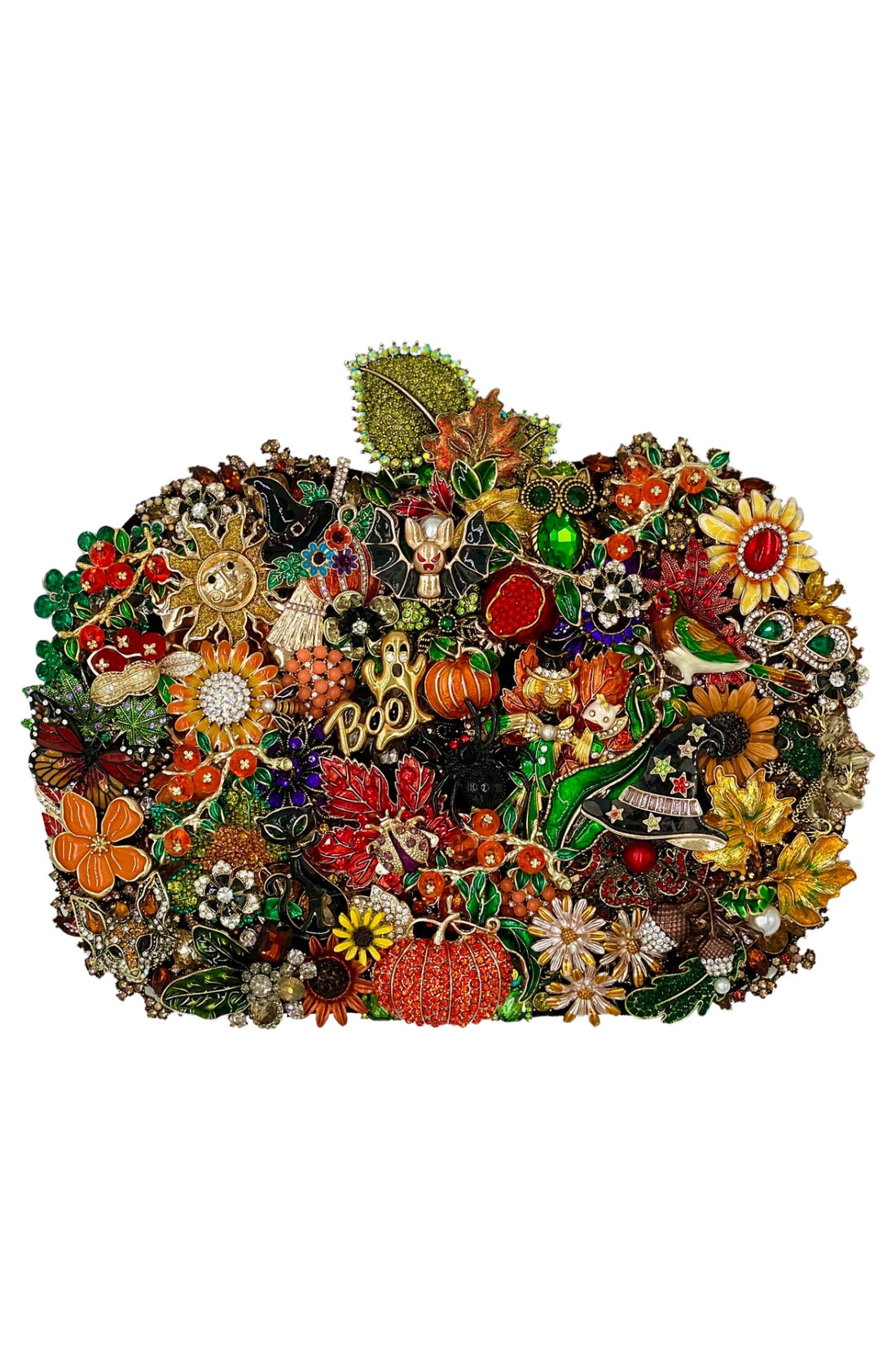 Ornate pumpkin-shaped clutch covered in colorful Halloween and autumn-themed jeweled brooches.