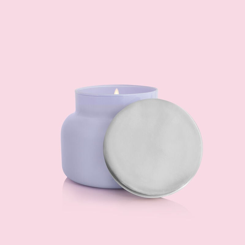 Volcano digital lavender signature jar candle with a smooth white wax surface inside a clear glass vessel.