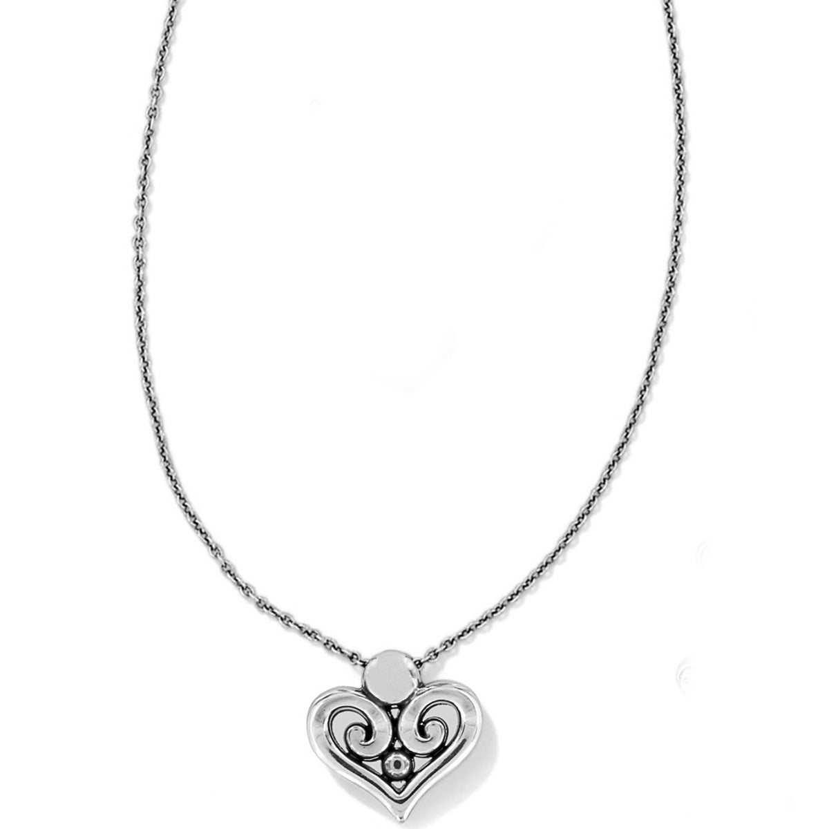 Silver plated necklace with a swirly filigree heart pendant topped by a Swarovski crystal.