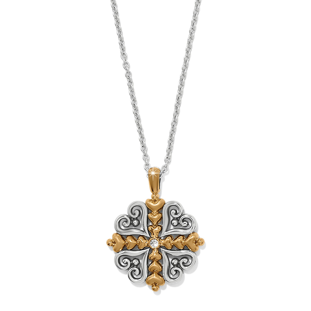 Silver-plated heart necklace with gold accents featuring fine quality crystals on a lobster claw closure