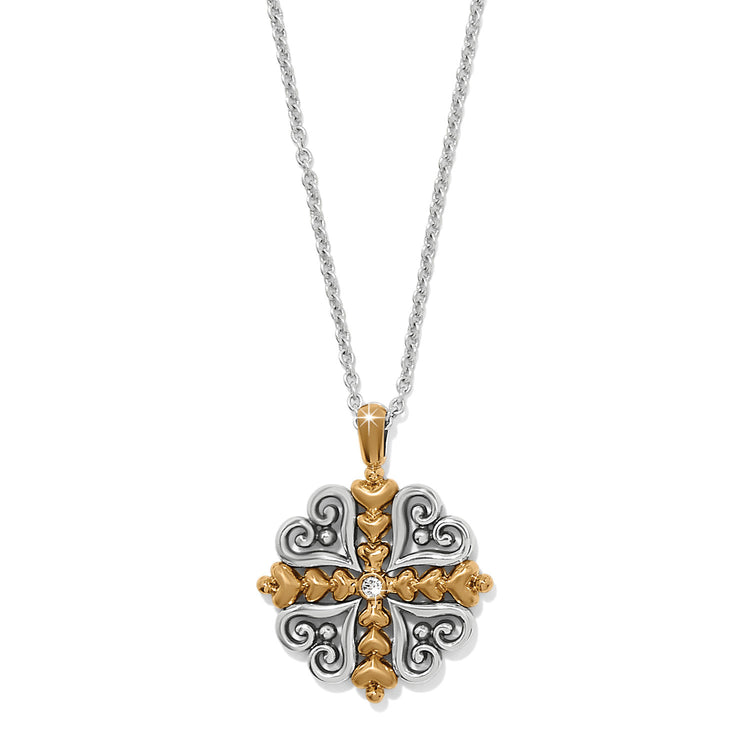 Silver-plated heart necklace with gold accents featuring fine quality crystals on a lobster claw closure