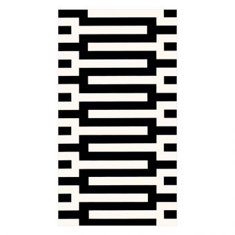 Triple-ply paper guest towel with water-soluble printed pattern in nontoxic ink.