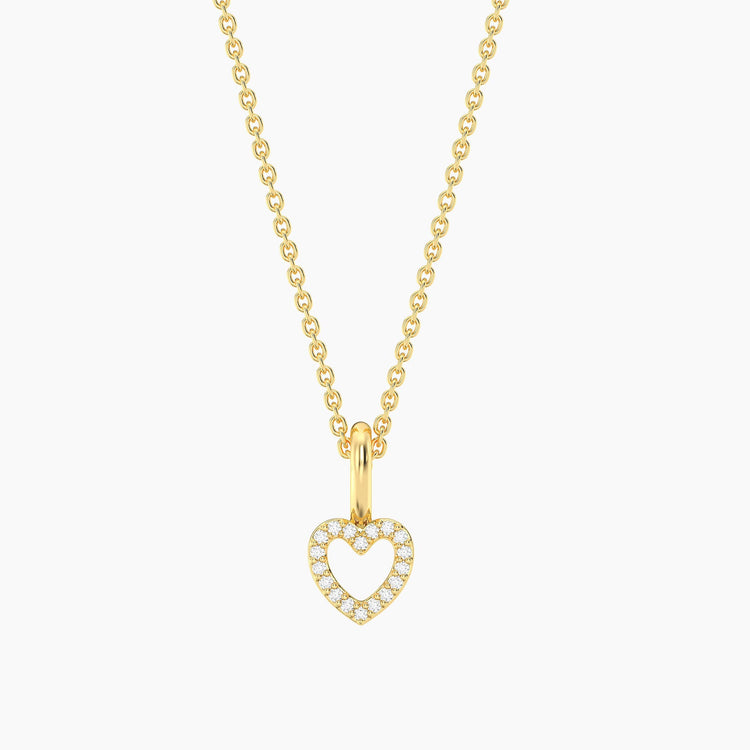 Gold plated waterproof petite heart pendant necklace with diamond accents on a delicate chain.