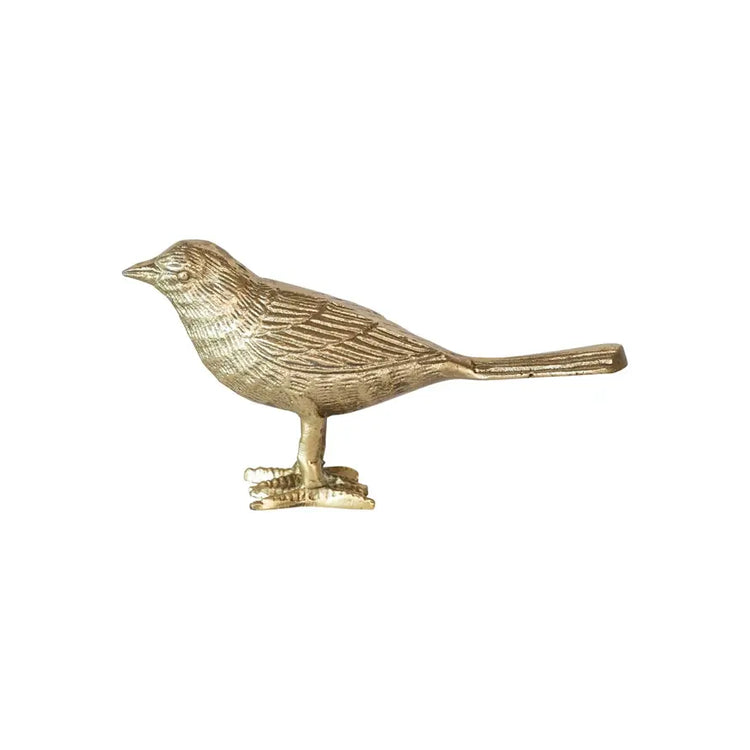 Cast aluminum bird sculpture in gold finish with a natural wing spread silhouette.