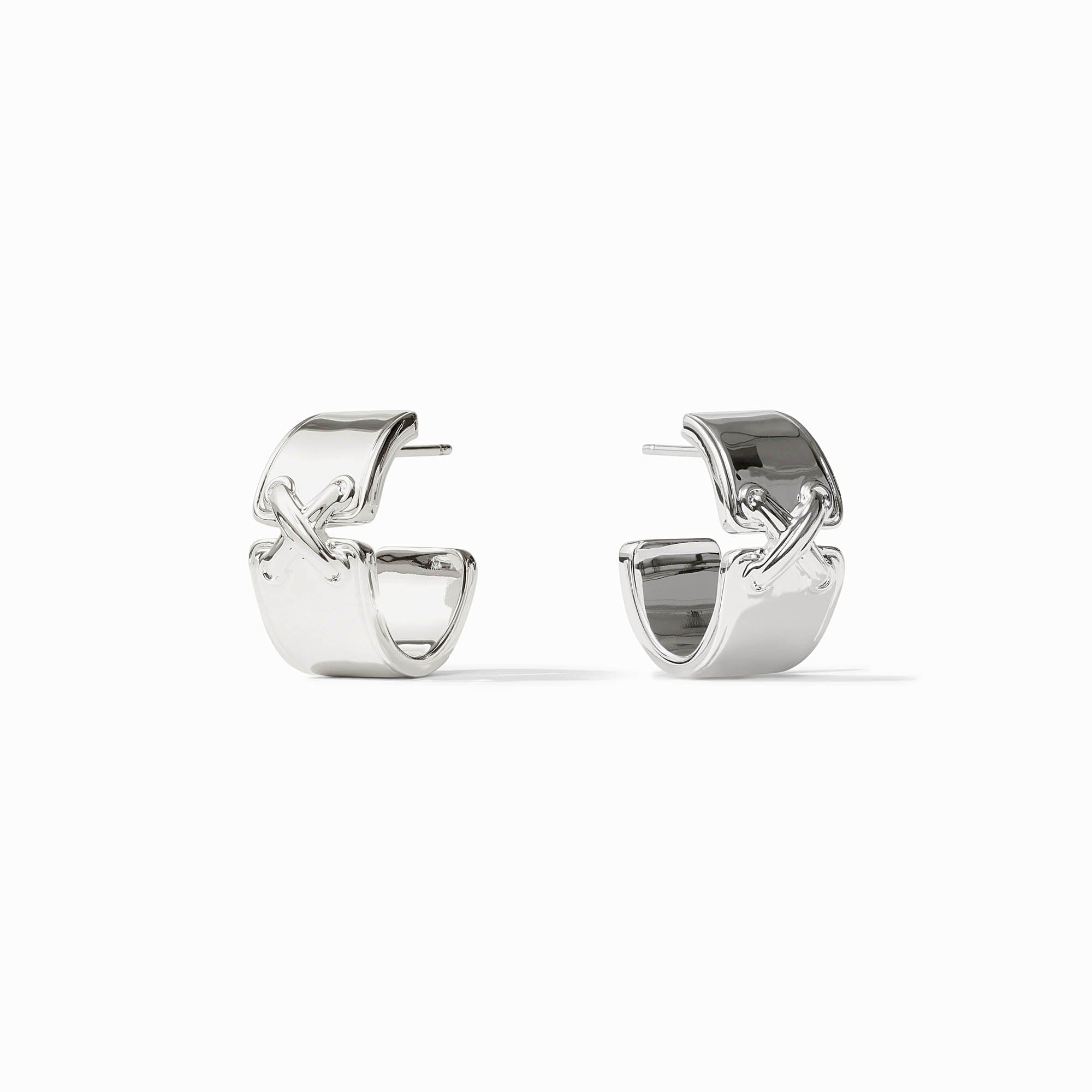 A pair of silver-plated Essex Hoop earrings with a wide band and a decorative cross detail.