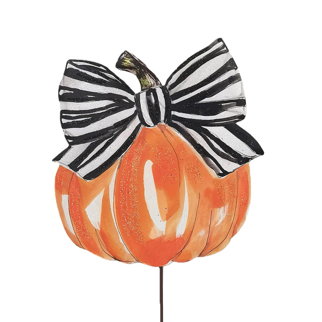 Orange watercolor pumpkin garden stake with a large black and white striped bow and glitter accents.