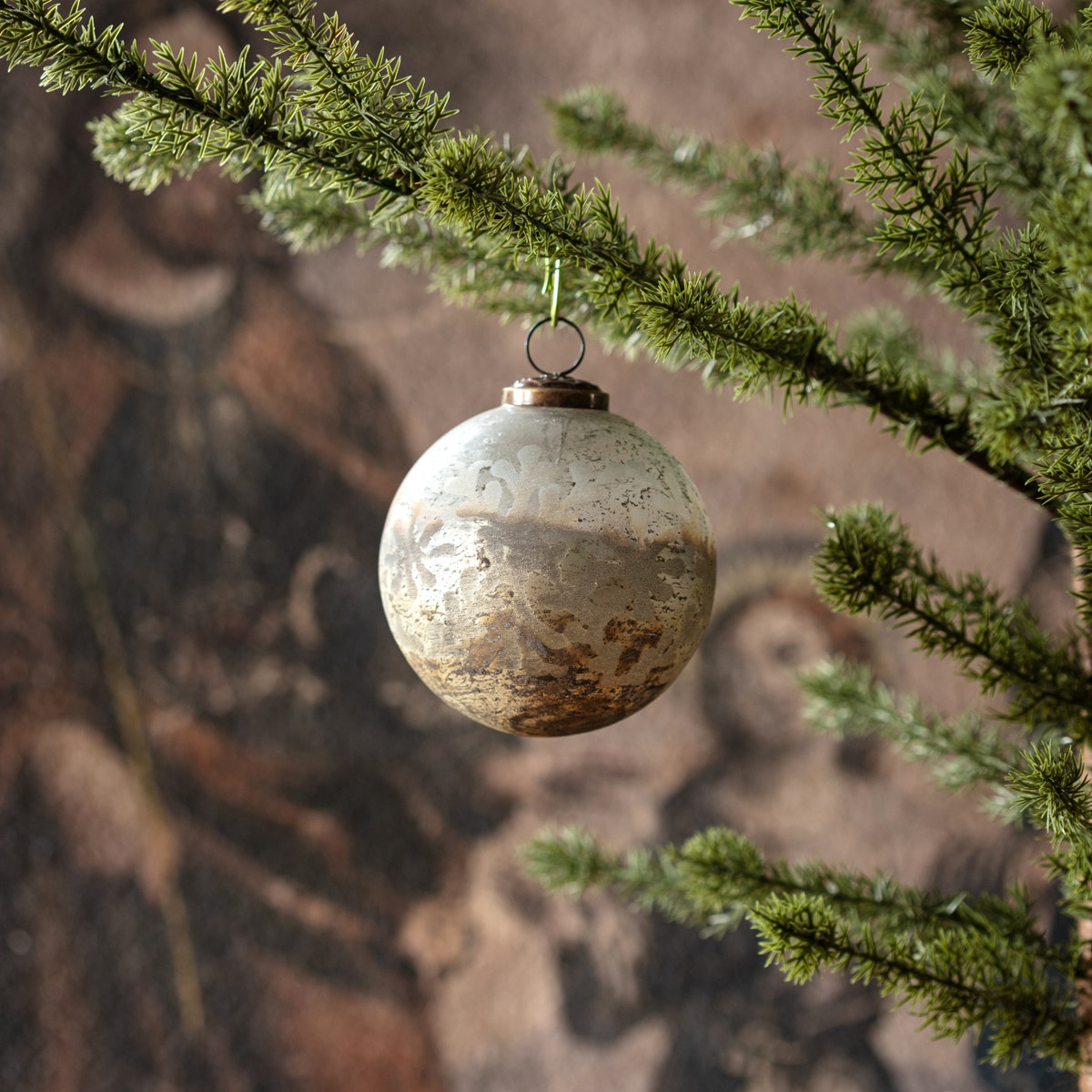 Square etched ornament in aged gold finish with ancient archaeological texture