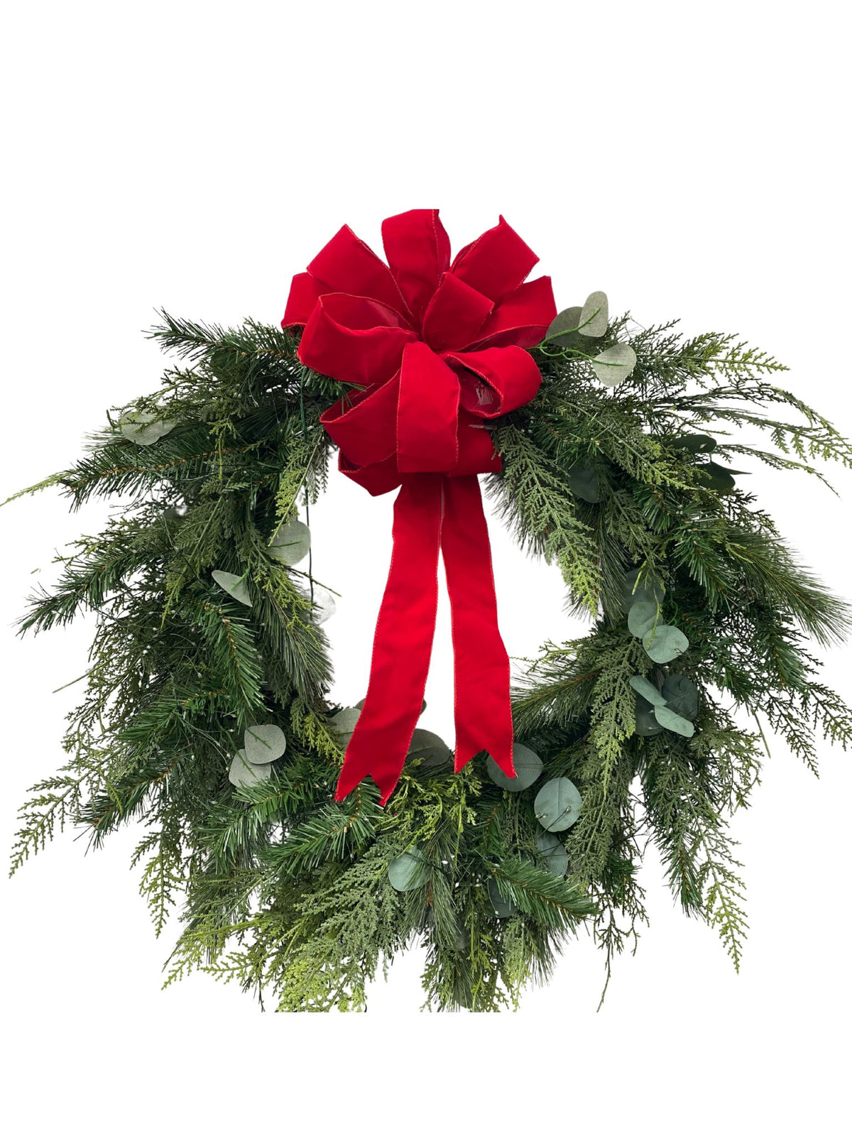 30-inch mixed evergreen and eucalyptus wreath featuring a large red velvet bow at the top.