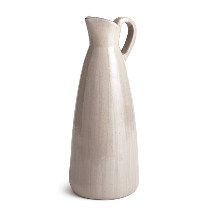 Handcrafted Ciara pitcher with a textured ceramic finish in earthy tones.