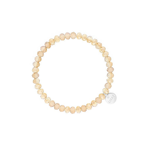 Stretchy bracelet with faceted glass beads in a colorful beaded pattern.