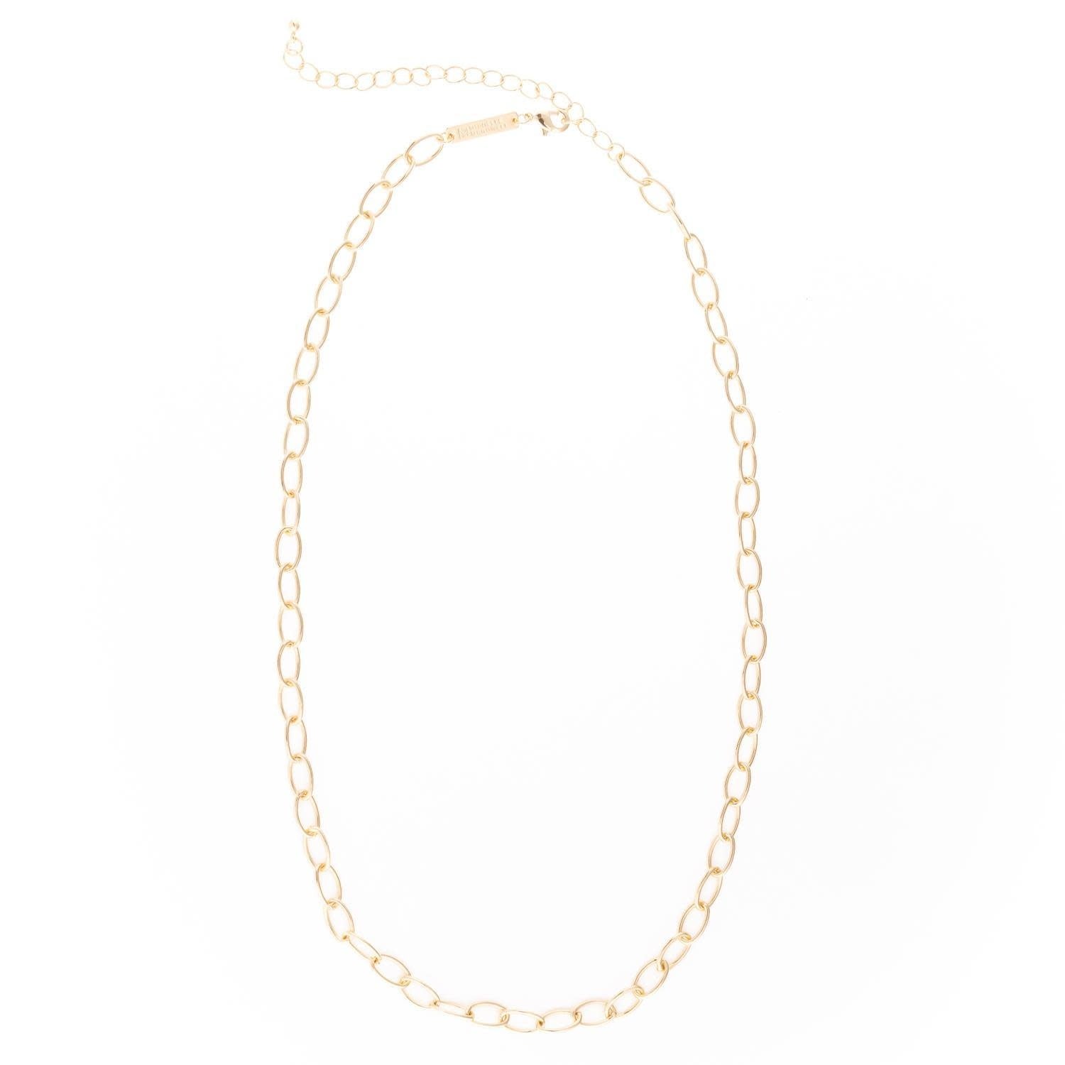 Gold-plated chain necklace with a small pendant on an extender.