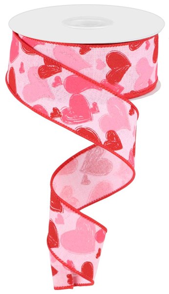 Light pink polyester fabric with white, red, and hot pink hand-drawn hearts pattern.