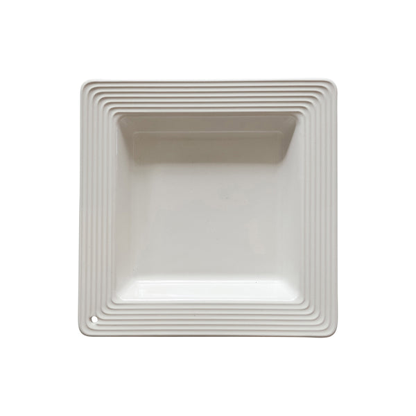 Striped candy napkin holder in white with red diagonal stripes.