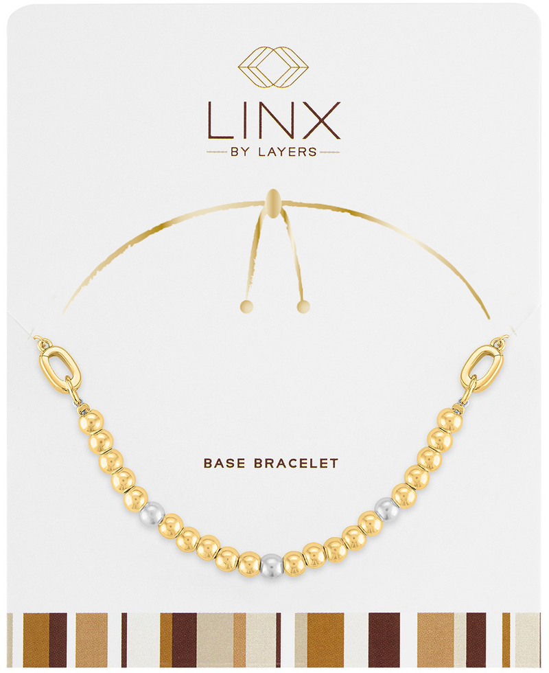 Gold and silver ball bead base bracelet with oval link ends on a white display card.