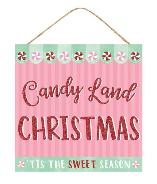 Square Candy Land Christmas sign with pink stripes, red glitter text, and peppermint accents.