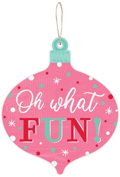 Pink ornament-shaped MDF sign with polka dots, snowflakes, and the text Oh what FUN!
