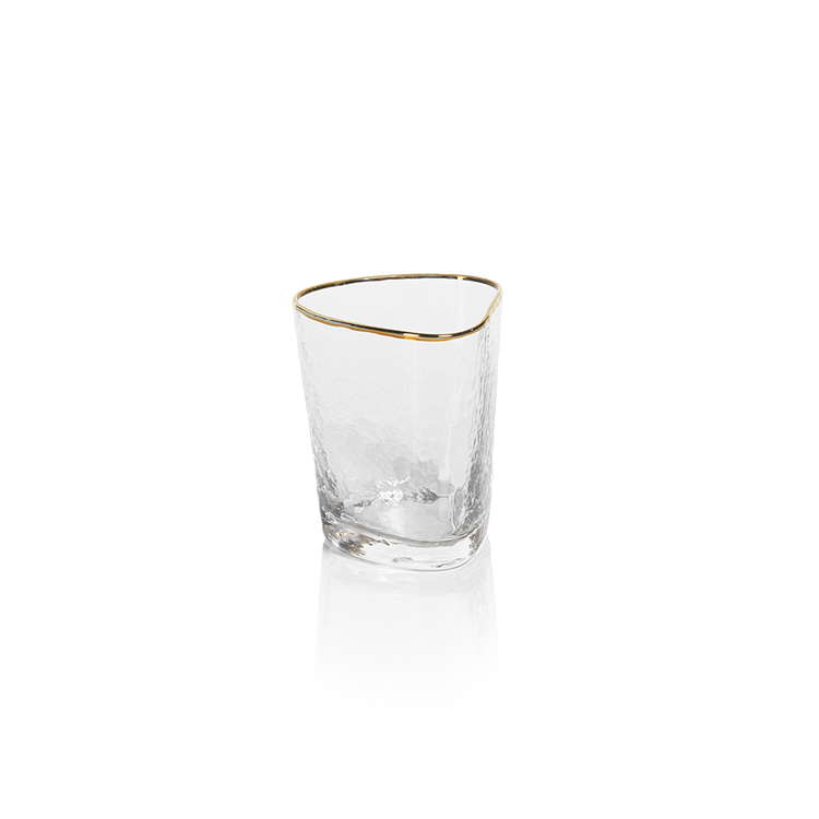 Clear triangular double old fashioned glass with textured surface and gold rim