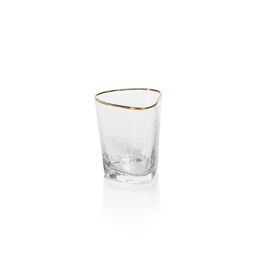 Clear triangular double old fashioned glass with textured surface and gold rim