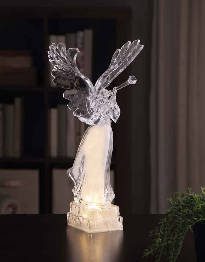 Golden Trumpeter Angel, a 16.5-inch tall clear acrylic LED figurine with wings and a trumpet.