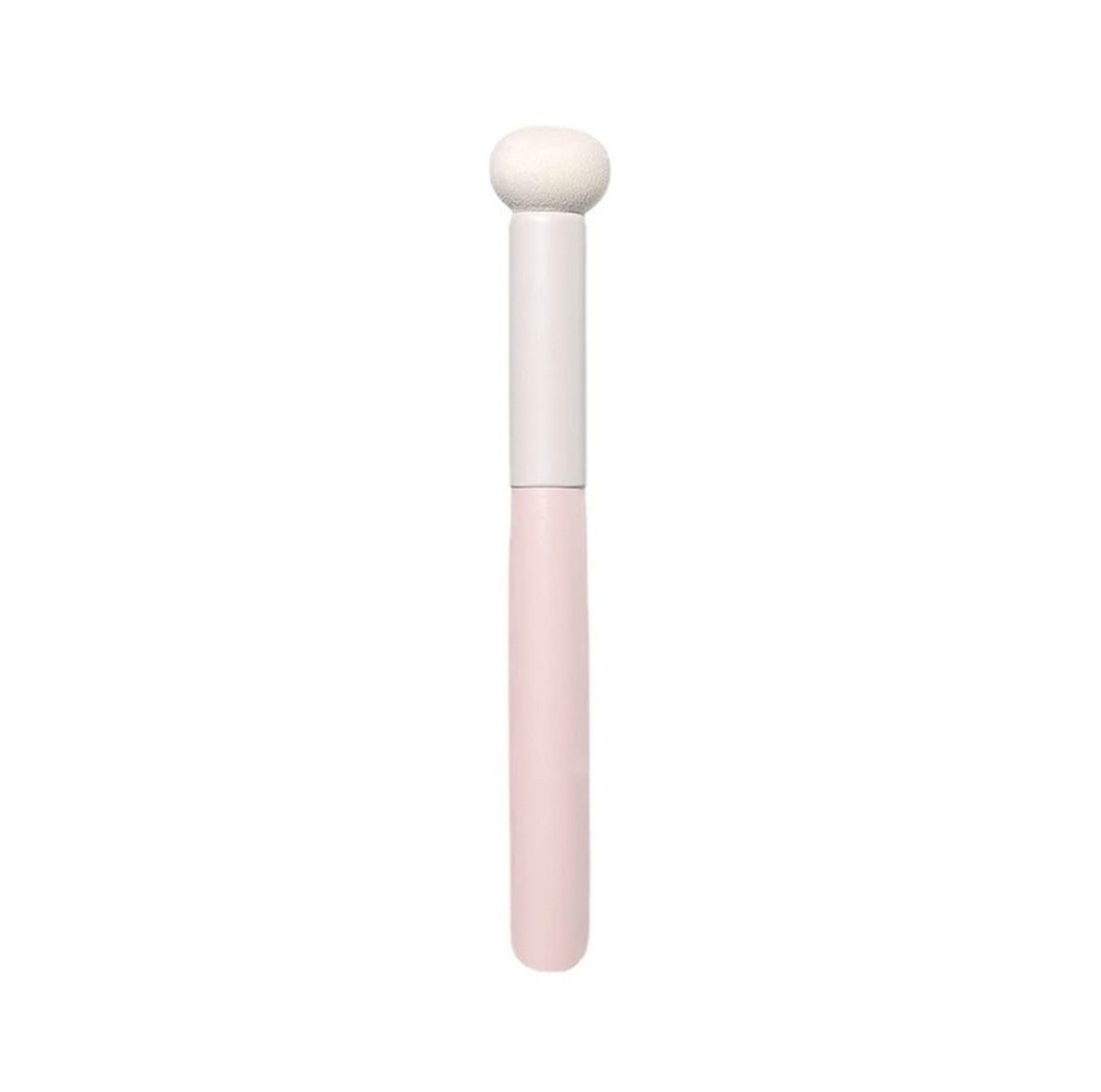Concealer brush with a round sponge tip and a light pink handle.