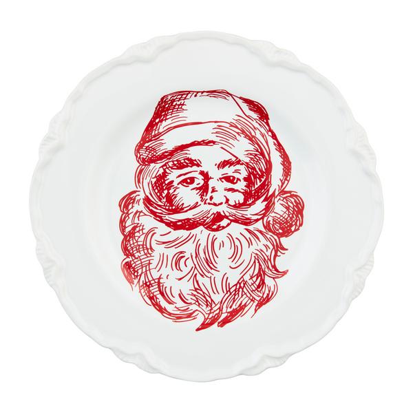 White stoneware Christmas dessert plate with festive holiday pattern.
