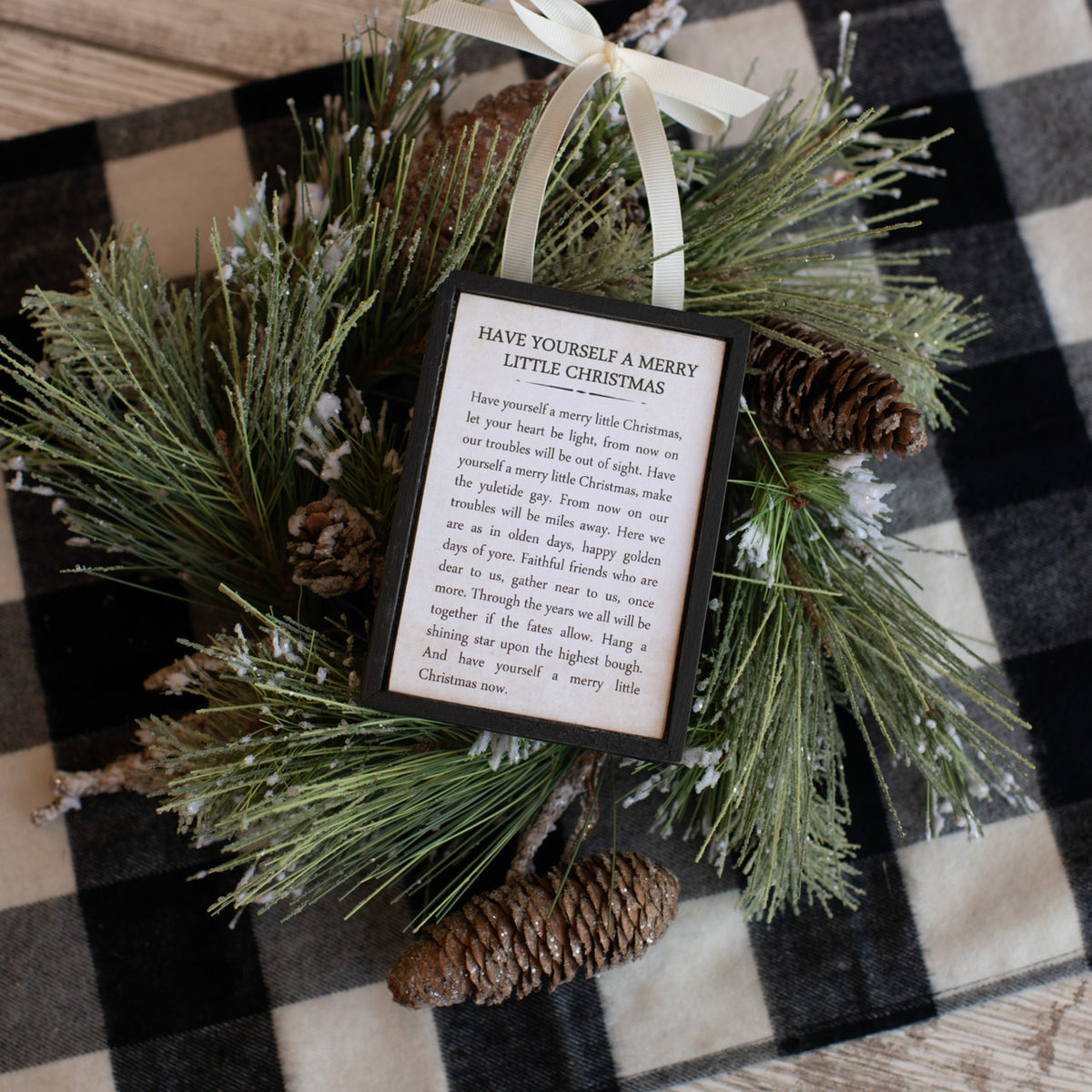 Wooden sign ornament shaped like a vertical rectangle with dimensions L:3.75in W:0.50in H:5.25in.