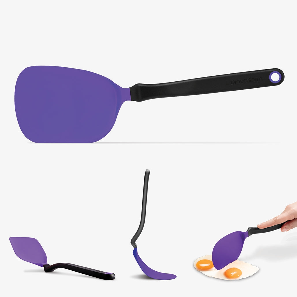 Black nylon spatula with flexible thin head designed for flipping food.