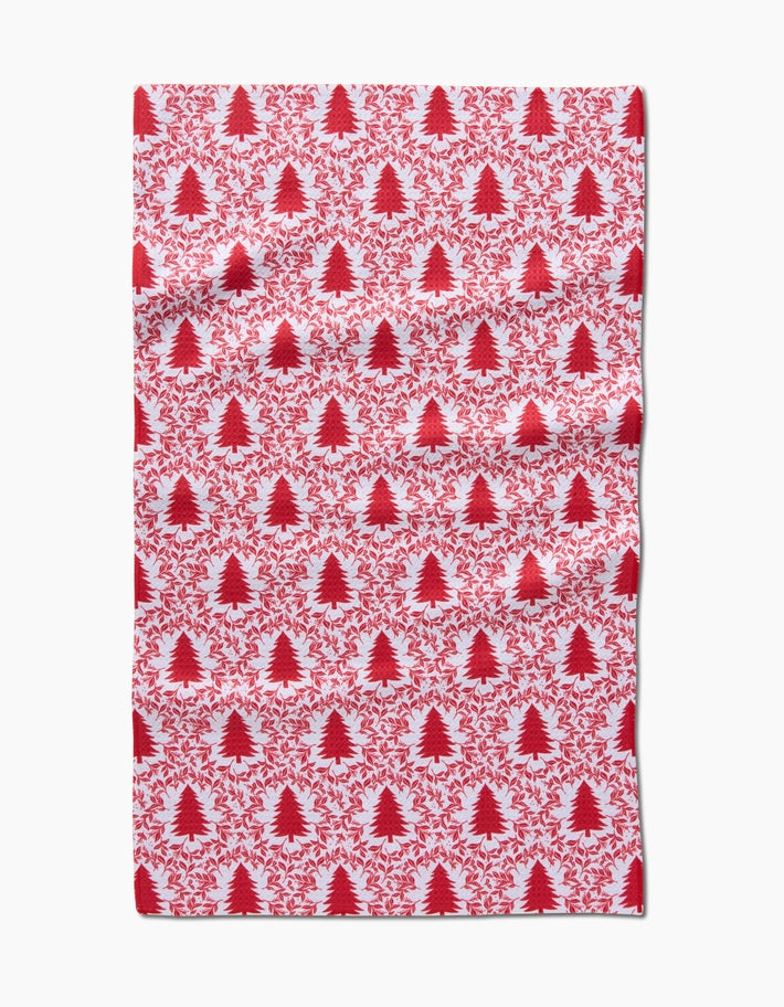 Holiday tea towel with waffle weave construction in red featuring a festive snowman pattern.