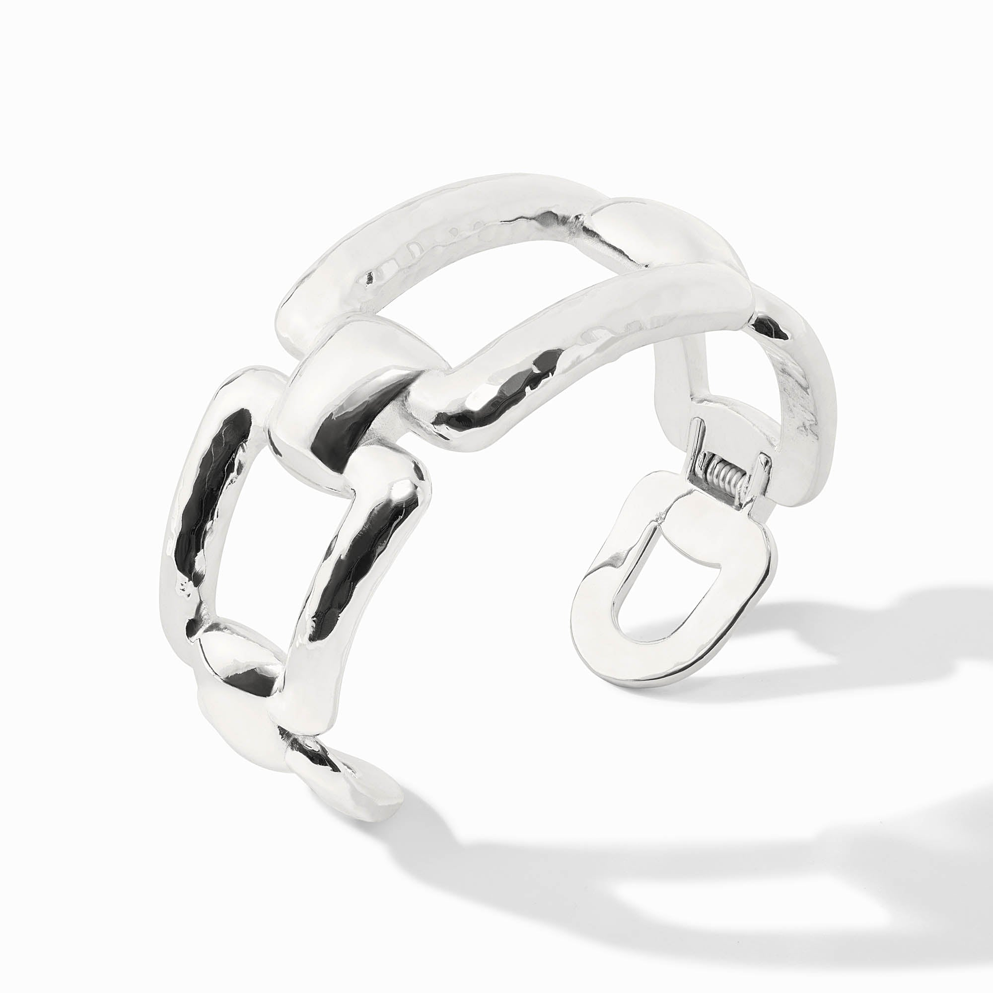 Sahara Cuff Silver: A wide, hammered silver-tone cuff bracelet with an open, interlocking link design.