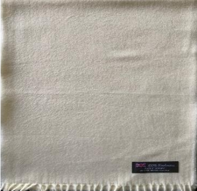 Off-white cashmere scarf with a fringed hem and a small rectangular brand label.