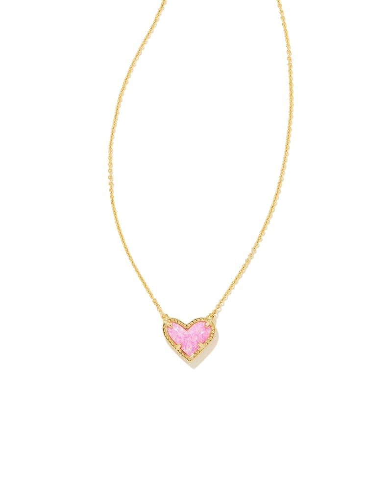 Bubblegum pink Ari Heart short pendant necklace with asymmetrical heart shape on a silver chain.