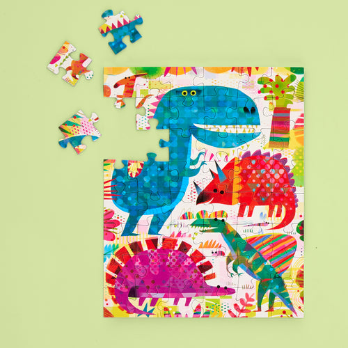 48-piece dinosaur jigsaw puzzle with colorful prehistoric animal illustrations on recycled board.
