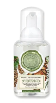Michel Design Works White Spruce Foaming Shea Butter Hand Soap in a clear mini bottle with pump.