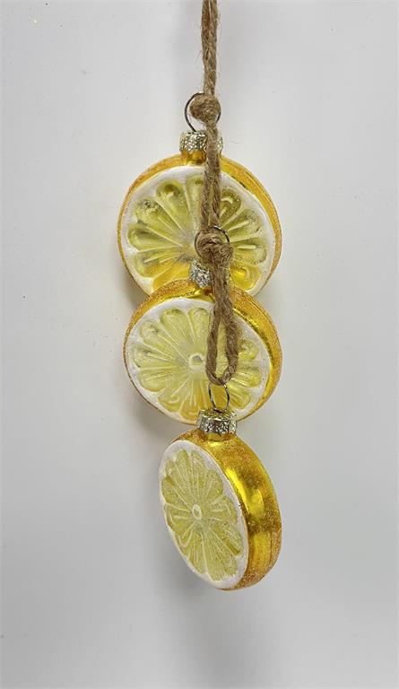 Three glass lemon slice ornaments hanging vertically from a rustic twine string.