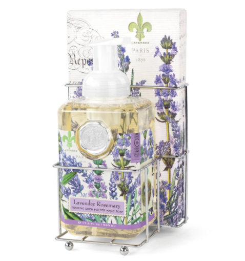 Foaming soap dispenser with matching napkin holder in a compact countertop set.