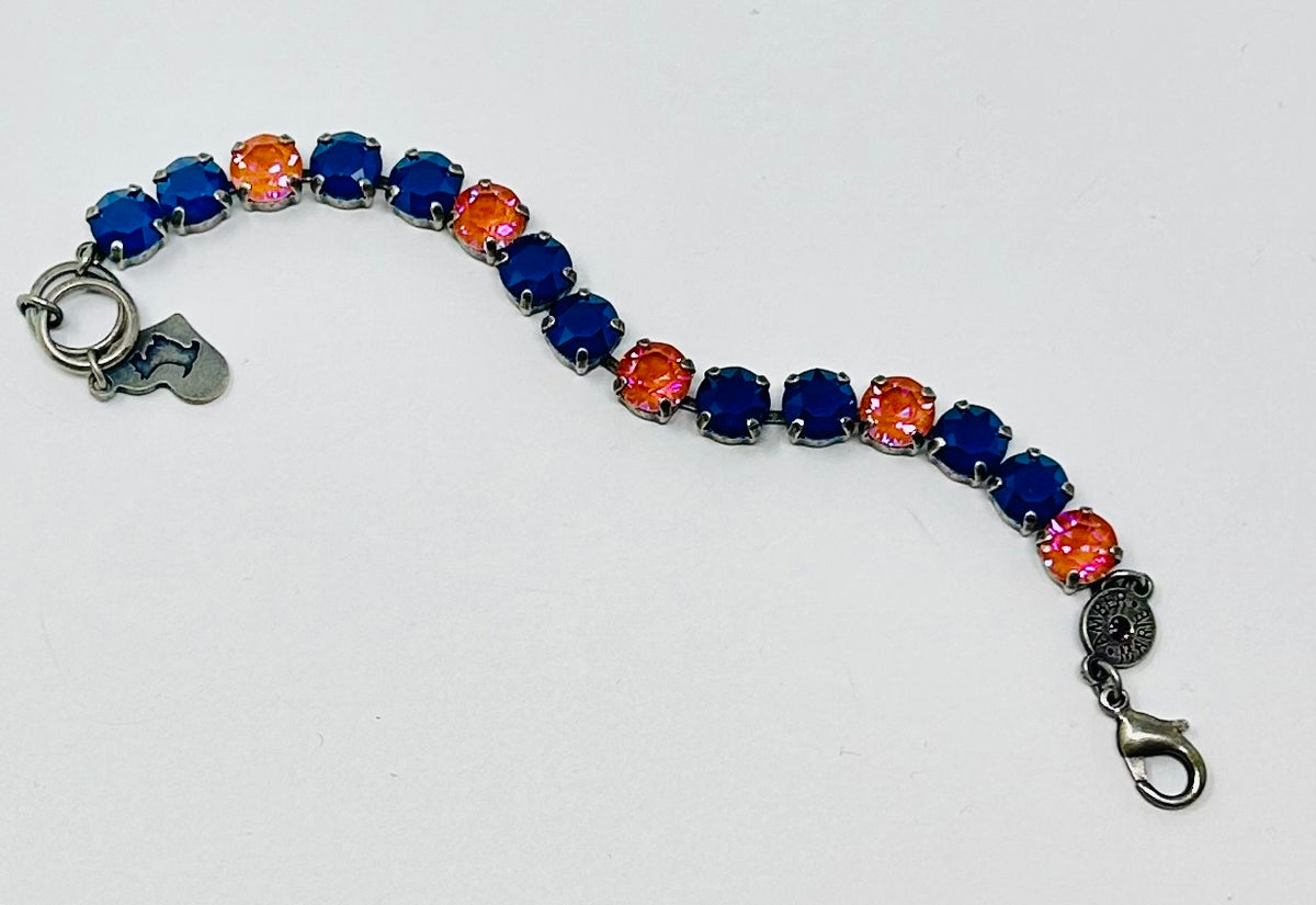 Bracelet featuring alternating blue and orange round crystals with a silver-tone metal chain.