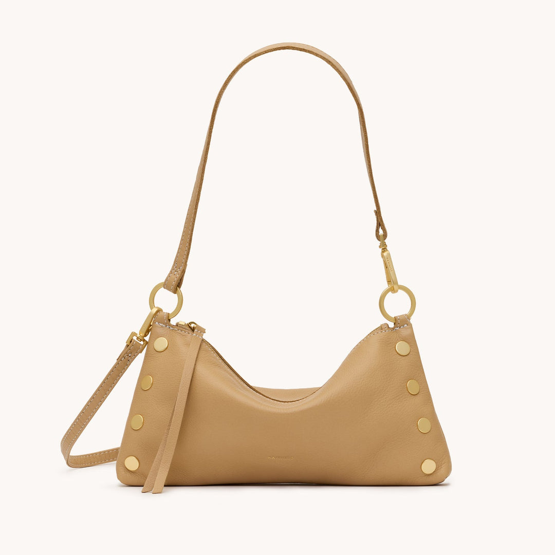 Tan leather Kyle Bag with gold studs, a short shoulder strap, and a long crossbody strap.