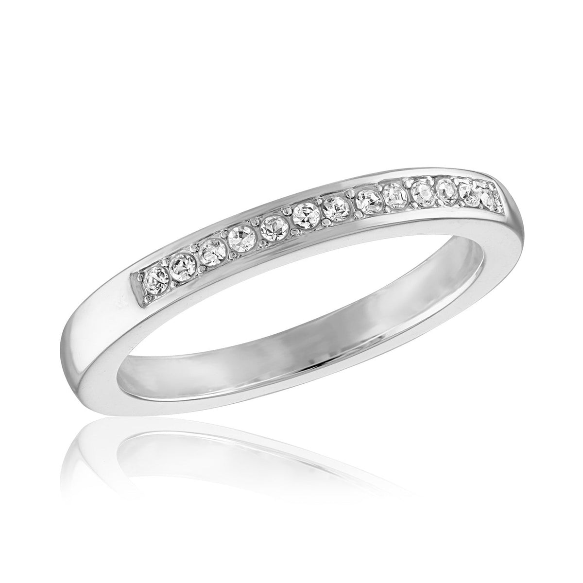 Stackable ring set featuring a silver CZ band with channel-set stones paired with gold layered rings.