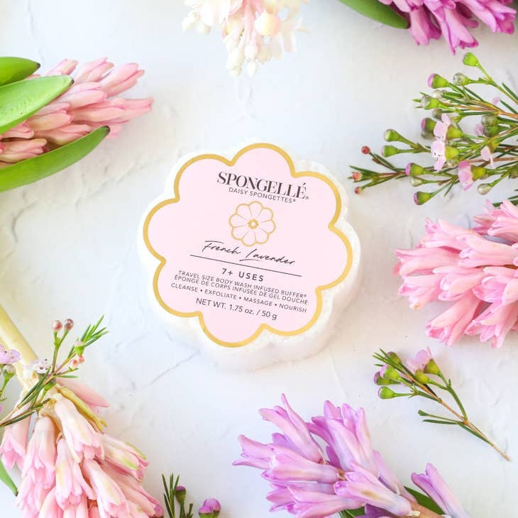 Daisy Collection Spongette body wash infused sponge in natural beige with built-in cleansing technology.