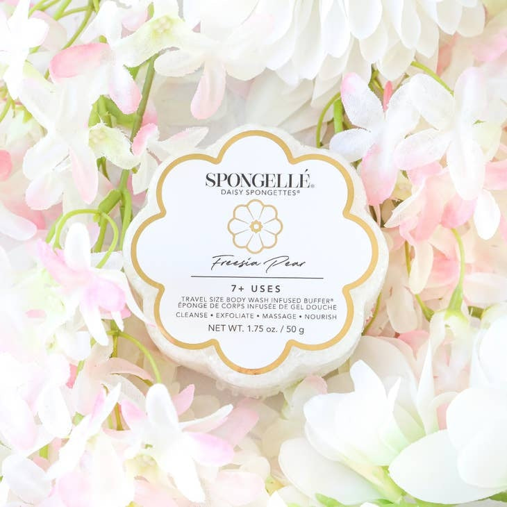 Daisy Collection Spongette body wash infused sponge in white with built-in cleansing technology.